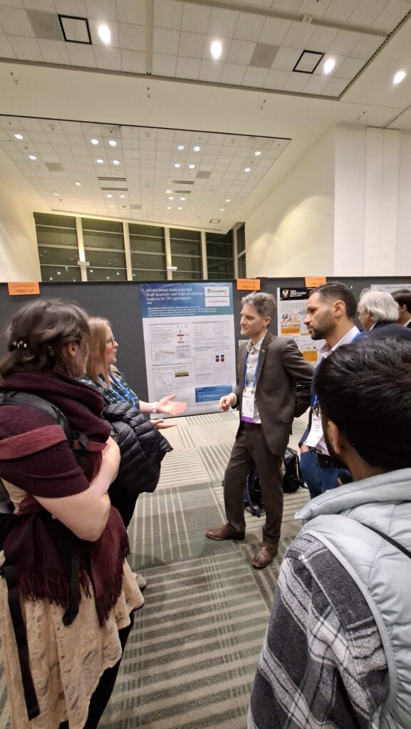 Henning Helmers from Fraunhofer ISE in a poster presentation of INFERNO